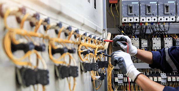 Professional Electrician technician working in Pine Air, FL